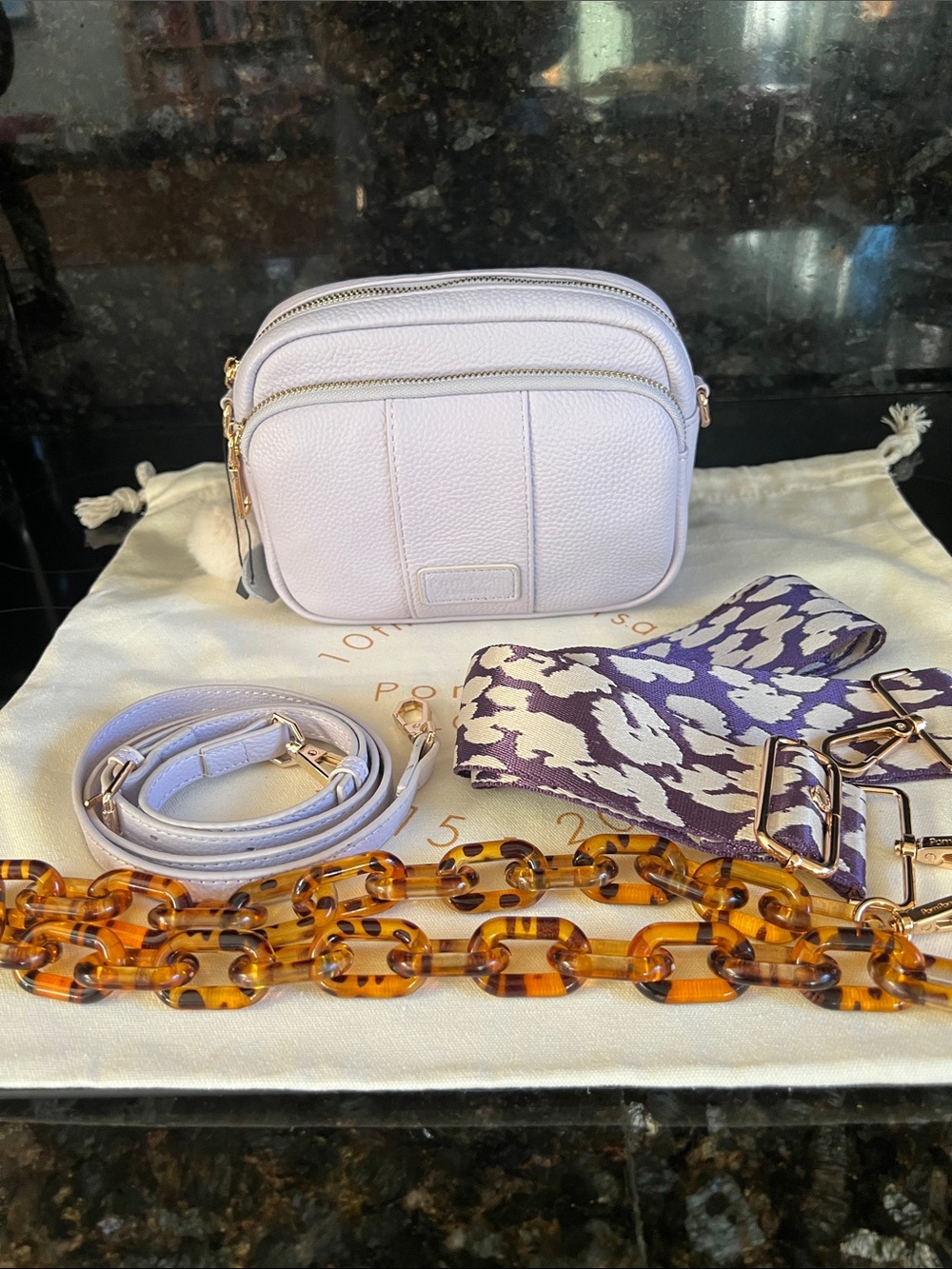 Pom Pom London Original Bag crossbody bag in Lilac